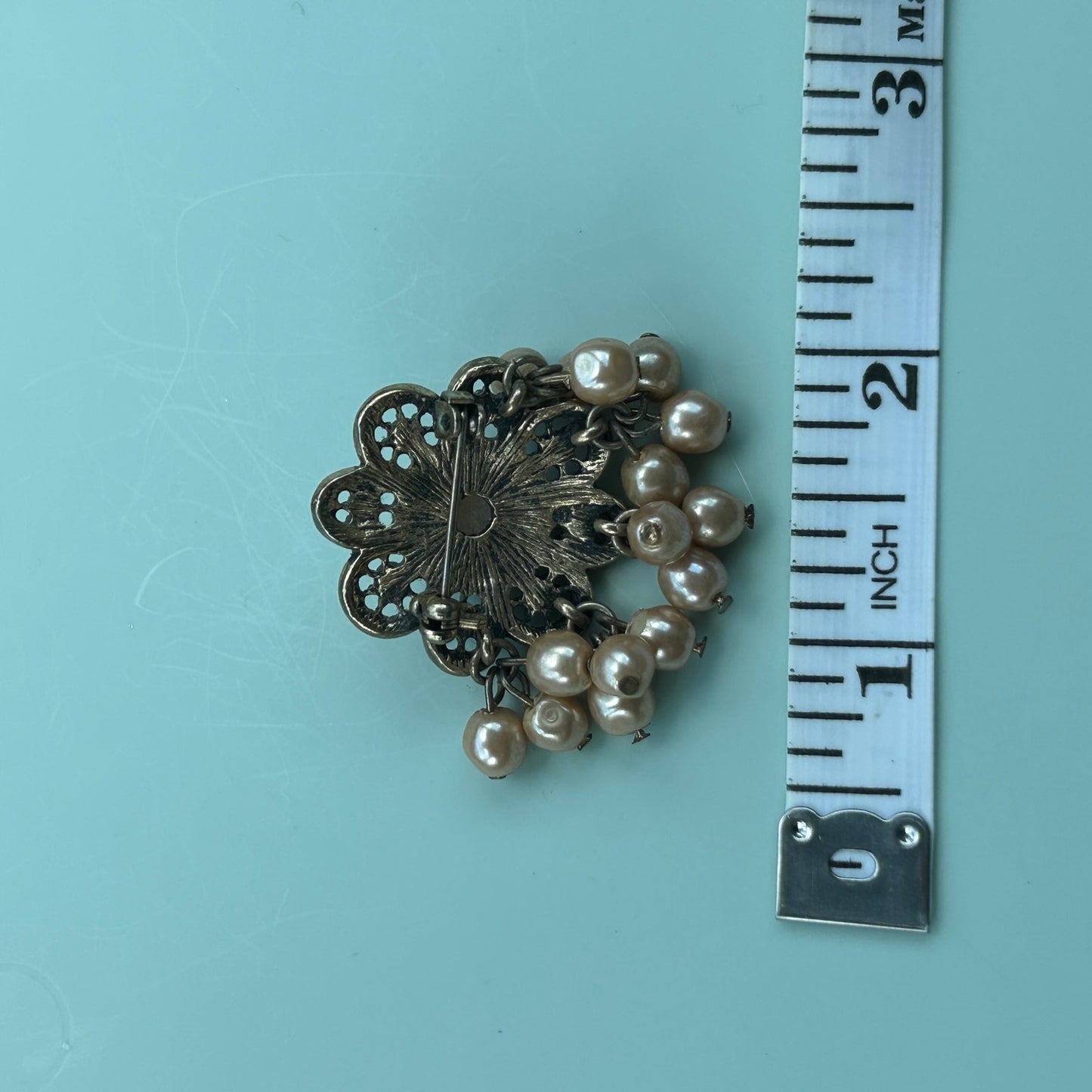 Antique Gold-Tone Floral Brooch with Rhinestones and Dangle Faux Pearls