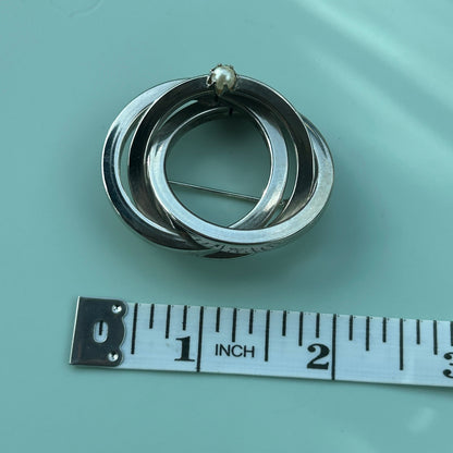Vintage Silver Tone Triple Interlocking Circle Brooch with Faux Pearl Accent