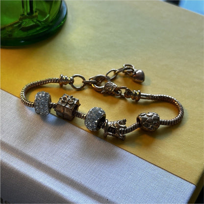 Gold Tone Adjustable Snake Chain Charm Bracelet with Crystal Bead Accents
