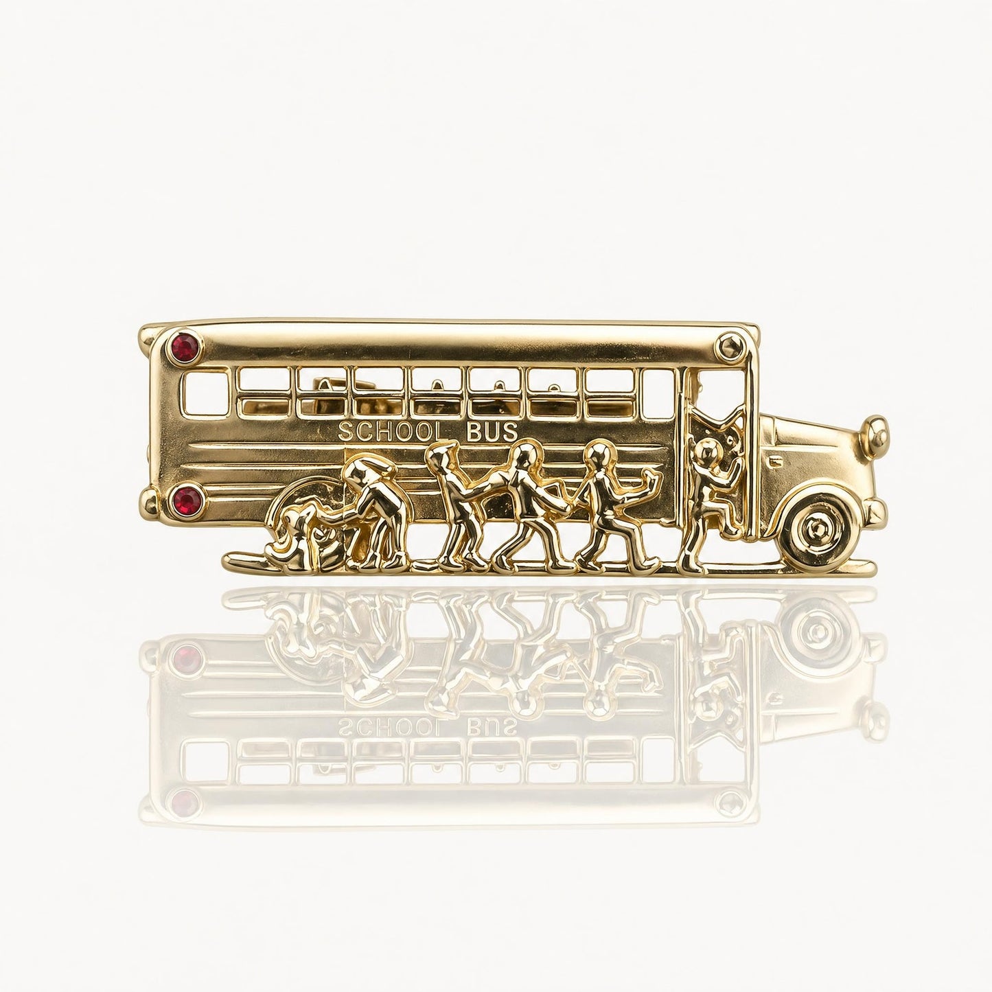 Vintage Gold Tone School Bus Brooch Pin with Red and Clear Rhinestone Accents