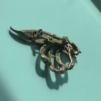 Vintage Gold-Tone Textured Ribbon Bow Brooch with Light Blue Rhinestone Accents