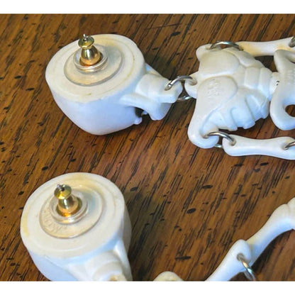 Vintage 1980s Skeleton Dangle Earrings | White Plastic "Dancing" Bones, Moveable