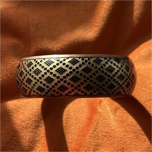 Gold Tone Patterned Metal Bangle Bracelet with Black Design