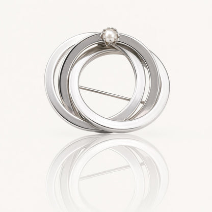 Vintage Silver Tone Triple Interlocking Circle Brooch with Faux Pearl Accent