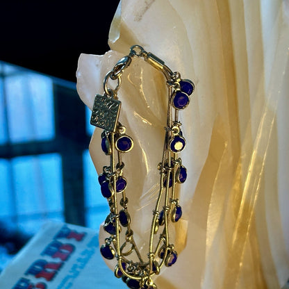 Gold Tone Multi-Strand Charm Bracelet with Blue Round Dangle Accents