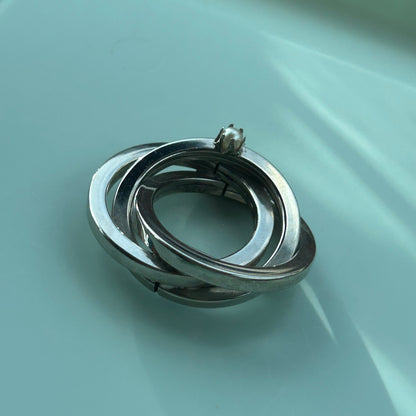 Vintage Silver Tone Triple Interlocking Circle Brooch with Faux Pearl Accent