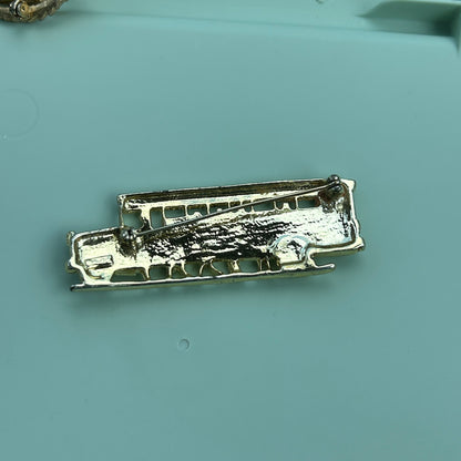 Vintage Gold Tone School Bus Brooch Pin with Red and Clear Rhinestone Accents
