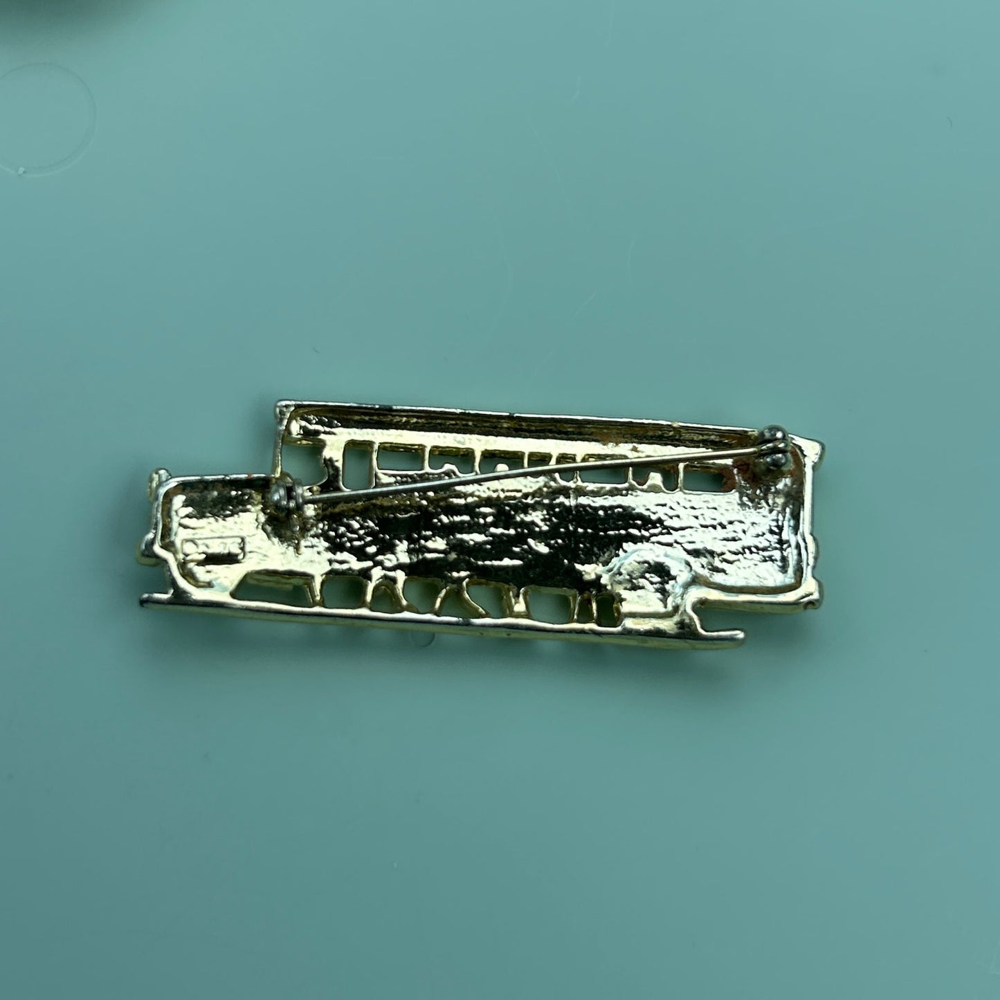 Vintage Gold Tone School Bus Brooch Pin with Red and Clear Rhinestone Accents